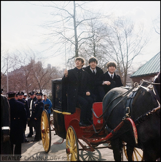 The Beatles Riding in a Carriage